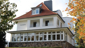 PEMATRA Villa Felsenburg FeWo Gartenblick in Travemünde